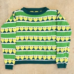 cute green knit sweater with yellow hearts